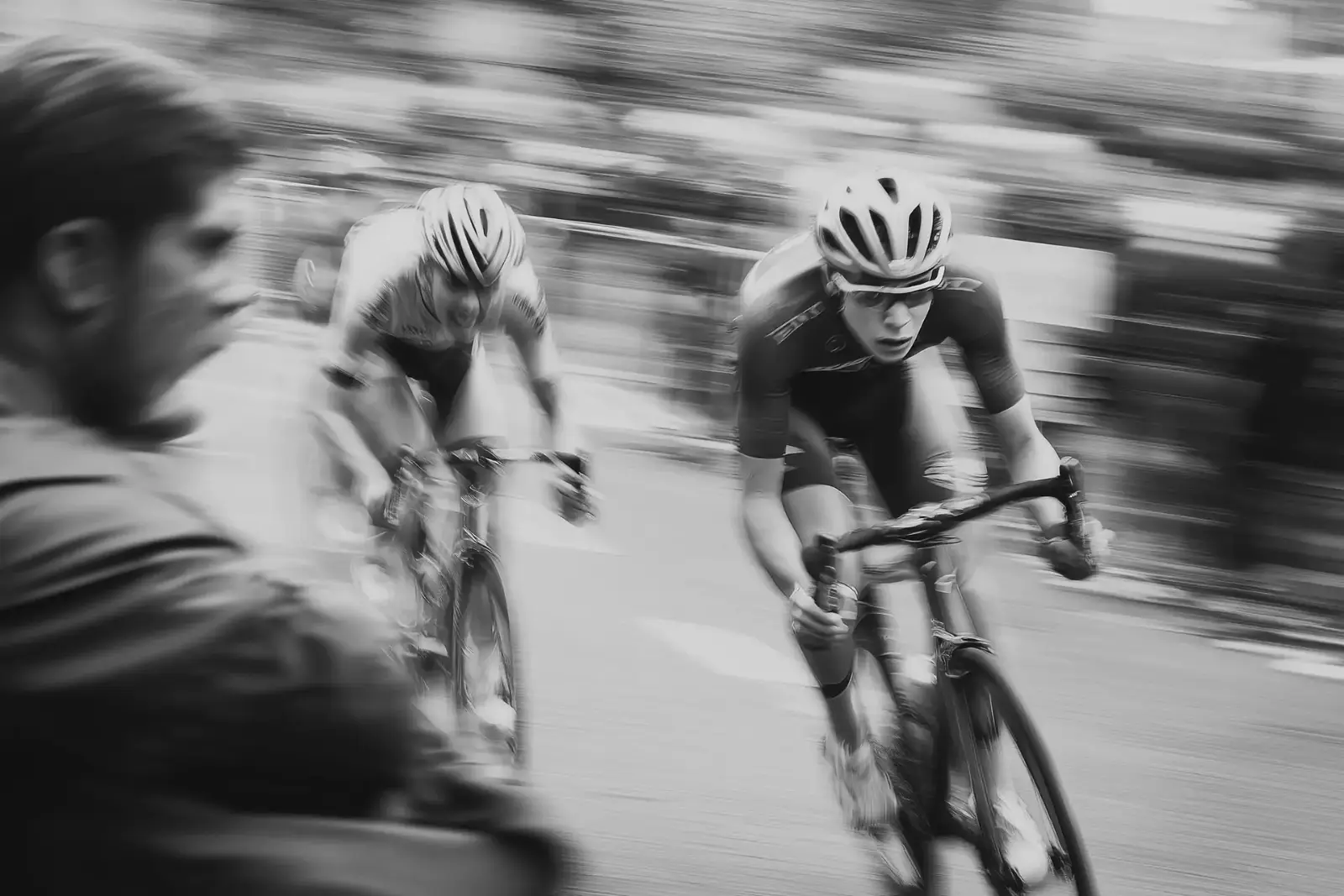 Cyclists in motion, black and white