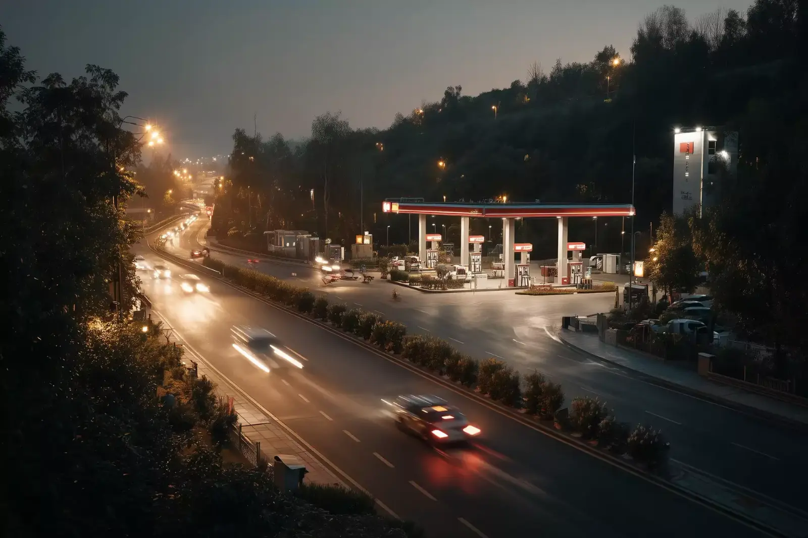 Evening road with the light trails of passing vans